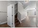 Inviting foyer with hardwood floors, leading to the living area and staircase at 461 Black Knight Way, Longwood, FL 32779
