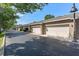 Row of attached garages showcasing ample parking space and exterior design at 461 Black Knight Way, Longwood, FL 32779