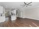 Bright living room featuring an open floor plan, ceiling fan, and hardwood floors at 461 Black Knight Way, Longwood, FL 32779