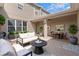Charming outdoor patio with comfortable seating and dining area, perfect for entertaining at 461 Black Knight Way, Longwood, FL 32779