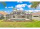 Large private pool and covered lanai in fenced yard at 4993 Hook Hollow Cir, Orlando, FL 32837