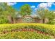 A beautiful sign that reads Pace's Mill, surrounded by colorful flora and lush landscaping at 4993 Hook Hollow Cir, Orlando, FL 32837