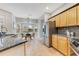 Spacious kitchen with stainless steel appliances, granite counters, and breakfast nook at 4993 Hook Hollow Cir, Orlando, FL 32837