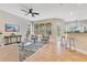 Open-concept living area with view of the bar counter and back patio at 4993 Hook Hollow Cir, Orlando, FL 32837