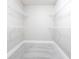 Empty walk-in closet features neutral walls, neutral carpet, and wire shelving at 4993 Hook Hollow Cir, Orlando, FL 32837