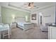 Bright bedroom with modern decor and a sitting area at 5220 Red Coral Cir, Mount Dora, FL 32757