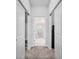 Hallway leading to the bathroom at 5220 Red Coral Cir, Mount Dora, FL 32757