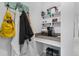 This modern mud room includes custom shelves and countertops for your convenience at 5220 Red Coral Cir, Mount Dora, FL 32757