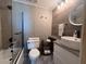 Bright bathroom with shower-tub combo, modern sink, and updated fixtures at 6165 Carrier Dr # 1801, Orlando, FL 32819