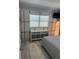 Contemporary bedroom featuring modern decor and minimalist design at 6165 Carrier Dr # 1801, Orlando, FL 32819