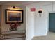 Elegant hallway with artwork and modern lighting, creating a welcoming space at 6165 Carrier Dr # 1801, Orlando, FL 32819