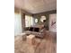 Stylish living room designed with a comfortable sofa, modern decor and sleek flooring, perfect for modern living at 6165 Carrier Dr # 1801, Orlando, FL 32819