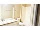 Clean bathroom featuring a vanity sink, mirror, toilet, and bathtub-shower combo at 6451 Old Park Ln # 407, Orlando, FL 32835