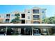 An exterior view of the condos at Stonebridge Commons at 6451 Old Park Ln # 407, Orlando, FL 32835