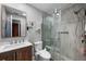 Updated bathroom featuring a tiled shower, modern fixtures, and a vanity at 6460 Parson Brown Dr, Orlando, FL 32819