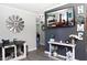 Hallway with stylish decor and a view into another living area, offering a modern aesthetic at 655 N Arnold Ave, Groveland, FL 34736