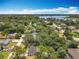 Wide aerial view of the neighborhood with a view of the nearby lake at 7375 Lake Dr, Sanford, FL 32771