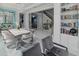 Spacious dining area with stylish decor and easy access to the rest of the home at 7550 John Hancock Dr, Winter Garden, FL 34787