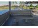 Dock bench provides a view of the lake, community, and covered boat lift at 7550 John Hancock Dr, Winter Garden, FL 34787