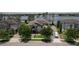 Beautiful, two-story home with stone accents, manicured lawn, and paved driveway at 7550 John Hancock Dr, Winter Garden, FL 34787