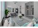 Open-concept living area showcasing elegant decor, recessed lighting, and seamless flow to other spaces at 7550 John Hancock Dr, Winter Garden, FL 34787