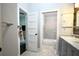 Modern bathroom with tub and shower combo, modern vanity, and neutral decor at 787 High Grove Park Ct, Oviedo, FL 32765
