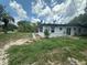 View of the yard area featuring the house at 795 Temple Ave, Orange City, FL 32763