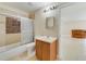 Bathroom featuring a shower and tub combo with decorative tile surround at 806 Sterling Spring Rd, Orlando, FL 32828