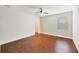 A well-lit bedroom featuring gleaming hardwood floors and neutral-colored walls, creating a serene atmosphere at 806 Sterling Spring Rd, Orlando, FL 32828