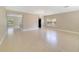 Large dining area featuring tile floors, a chandelier, and access to the kitchen and other living spaces at 806 Sterling Spring Rd, Orlando, FL 32828