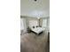 Relax and recharge in this main bedroom with a king-size bed and lots of natural light at 851 Drop Shot Dr, Davenport, FL 33896