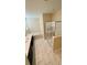 Main bathroom featuring a soaking tub, stand up shower, and double vanity at 851 Drop Shot Dr, Davenport, FL 33896