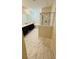 Elegant primary bathroom with a tub, shower, and double sink vanity with marble flooring at 851 Drop Shot Dr, Davenport, FL 33896