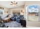 Cozy living room with comfortable seating, soft rug and bright natural light at 1111 Liberty Ave, Mount Dora, FL 32757