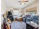 Relaxing living room with comfortable furniture and entertainment setup at 1111 Liberty Ave, Mount Dora, FL 32757