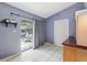 Mud room with access to back yard and storage at 1111 Liberty Ave, Mount Dora, FL 32757