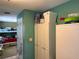 Pantry area between a bedroom and a pantry featuring cabinetry to the ceiling at 11314 Huggins St, Leesburg, FL 34788