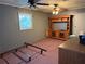 Empty bedroom featuring ceiling fans at 11314 Huggins St, Leesburg, FL 34788