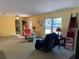 Bright living room featuring natural light at 11314 Huggins St, Leesburg, FL 34788