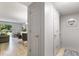Hallway view into the living room, highlighting the seamless transition and modern design at 141 Lewfield Circle # 141, Winter Park, FL 32792