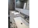 Bathroom features granite countertops with double sinks and chrome fixtures at 1620 Hialeah St, Orlando, FL 32808