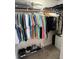 A walk-in closet stocked with an array of colorful clothing at 1620 Hialeah St, Orlando, FL 32808