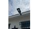 Energy-efficient exterior lights and security cameras enhance this home at 1620 Hialeah St, Orlando, FL 32808