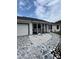 Charming single-story home featuring a welcoming front porch and a well-manicured garden at 1620 Hialeah St, Orlando, FL 32808