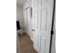 Hallway with the view of bedroom's door and closet's sliding door at 1620 Hialeah St, Orlando, FL 32808