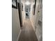 Long hallway with tile flooring at 1620 Hialeah St, Orlando, FL 32808