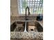 Kitchen sink with stainless steel faucet and granite countertops at 1620 Hialeah St, Orlando, FL 32808