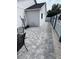 Paved patio features outdoor exercise equipment and an outdoor seating area at 1620 Hialeah St, Orlando, FL 32808