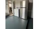 The utility room features a stainless steel refrigerator and a washing machine at 1620 Hialeah St, Orlando, FL 32808