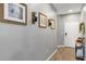 Clean foyer with modern decor and a view of the front door at 16406 Blooming Cherry Dr, Groveland, FL 34736
